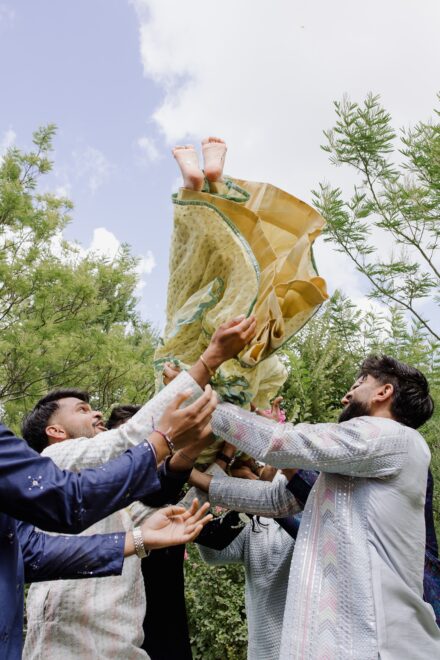 Emotional moment between Reeya and Neil after the Haldi ceremony, captured in natural light at Hotel Roma Life Style.