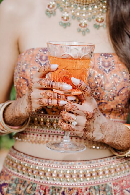 Guests enjoying Aperol Spritz and Italian appetizers during the Sangeet party in Rome.