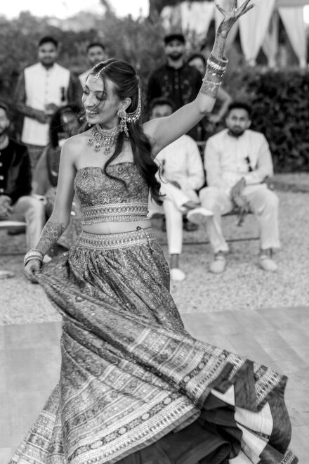 Candid moment of Reeya and Neil dancing and laughing during their Sangeet celebration at Villa Piccolomini.