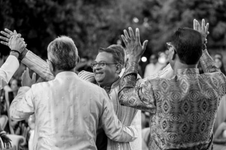 Family and friends performing traditional dances during the Sangeet celebration in Rome, captured by Cossu Photography.