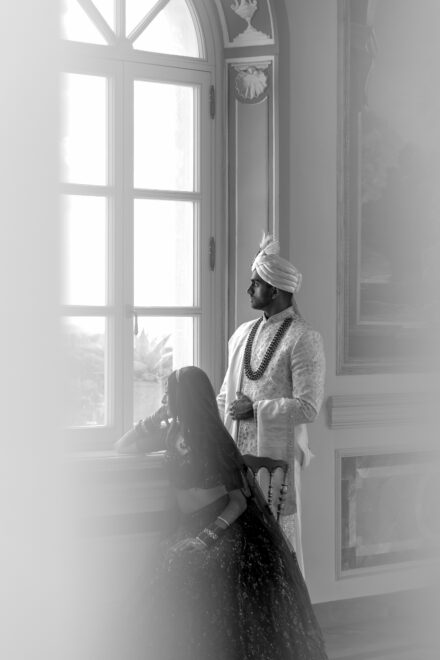 Bride and groom portrait inside Villa Miani, blending Indian tradition with Italian elegance.