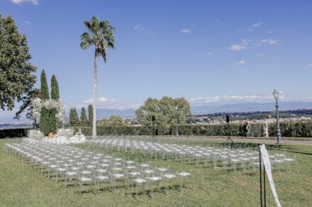 Elegant floral decorations and ceremony setup for an Indian wedding at Villa Miani, Rome.