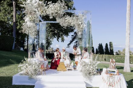 Wedding ceremony at Villa Miani with Reeya and Neil exchanging vows under the Italian sunlight.