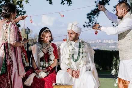 Wedding ceremony at Villa Miani with Reeya and Neil exchanging vows under the Italian sunlight.