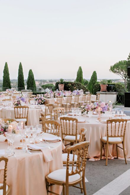 Elegant floral details and dinner setup at Villa Miani, Rome, for Reeya and Neil’s Indian wedding.