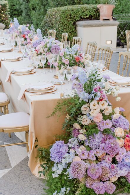 Elegant floral details and dinner setup at Villa Miani, Rome, for Reeya and Neil’s Indian wedding.