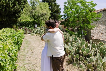 Dan and Sophie embracing after their surprise proposal in Chianti
